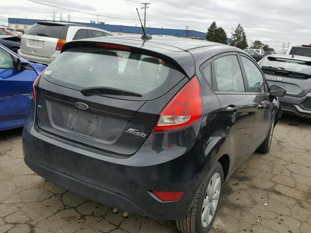 3FADP4EJXBM108766 - 2011 FORD FIESTA SE BLACK photo 4