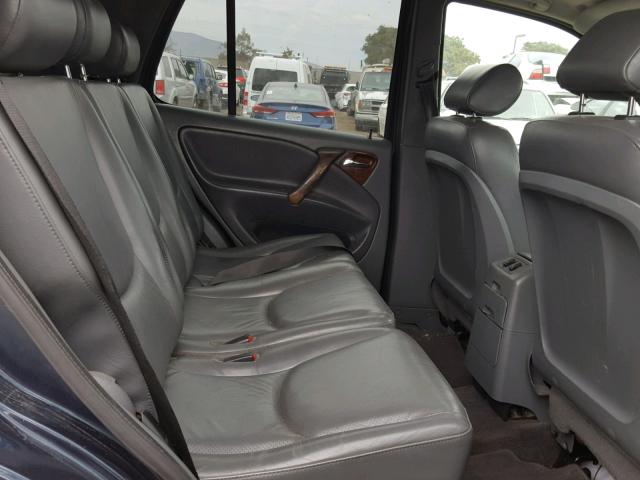 4JGAB72E8XA099120 - 1999 MERCEDES-BENZ ML 430 Blau Foto 6