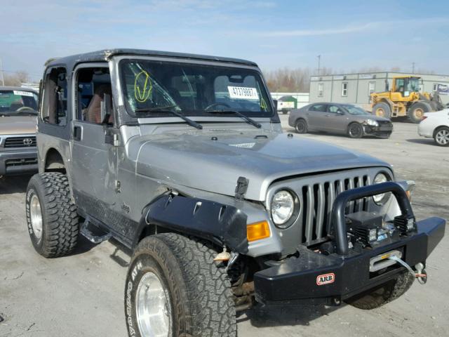 1J4FA49S3YP792158 - 2000 JEEP WRANGLER / SILVER photo 9