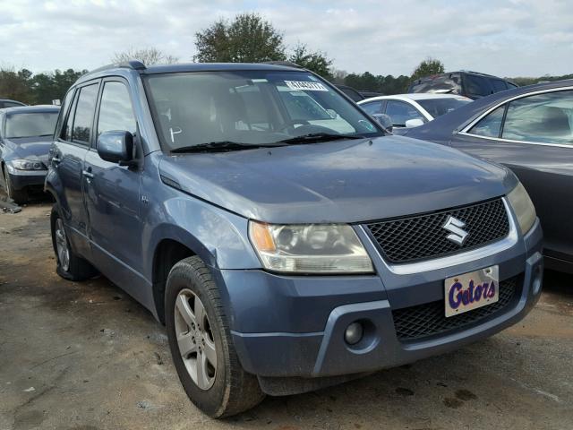 JS3TE944874202007 - 2007 SUZUKI GRAND VITA GRAY photo 1