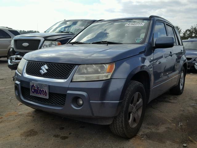 JS3TE944874202007 - 2007 SUZUKI GRAND VITA GRAY photo 2