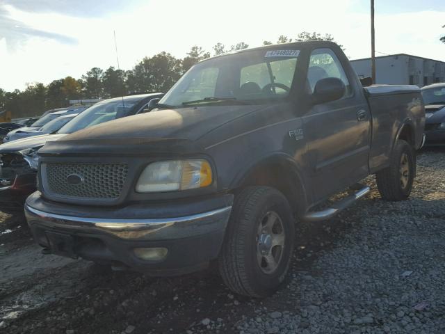 2FTRF18W0XCB19223 - 1999 FORD F150 BLACK photo 2