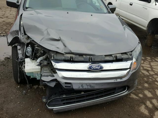 3FAHP0HA8BR127504 - 2011 FORD FUSION SE GRAY photo 7