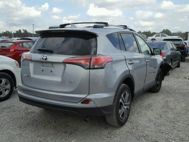 2T3ZFREV4HW343268 - 2017 TOYOTA RAV4 LE SILVER photo 4