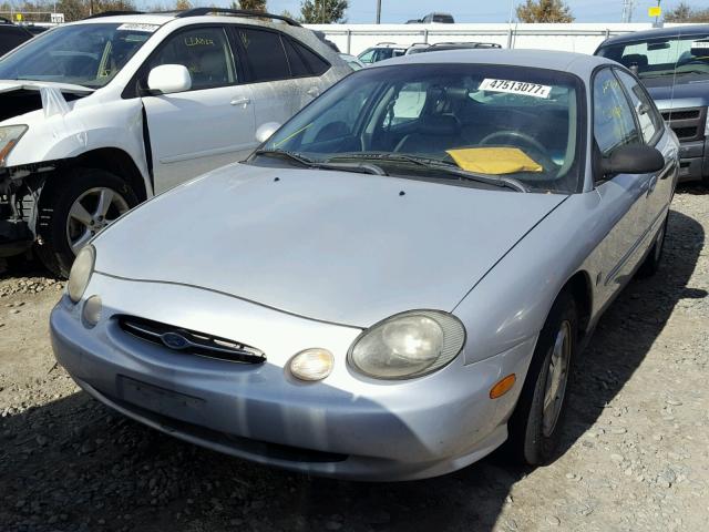 1FAFP53S2XG182534 - 1999 FORD TAURUS SE SILVER photo 2