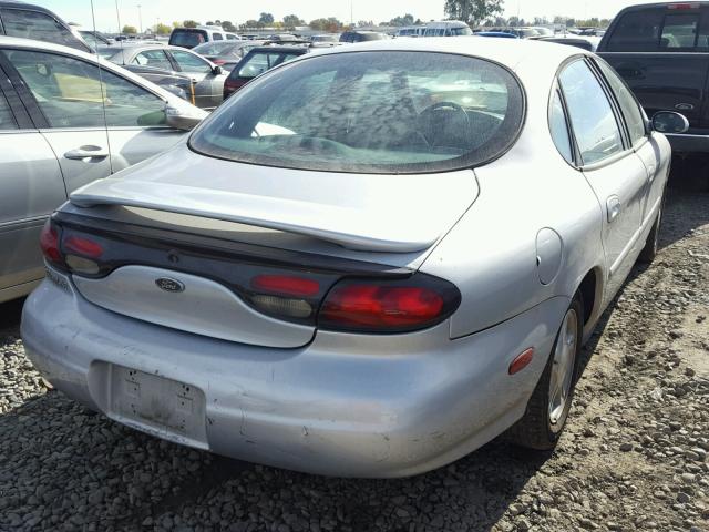 1FAFP53S2XG182534 - 1999 FORD TAURUS SE SILVER photo 4