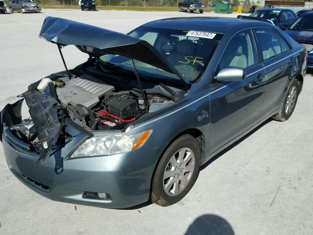 4T1BK46K67U523489 - 2007 TOYOTA CAMRY NEW GREEN photo 2