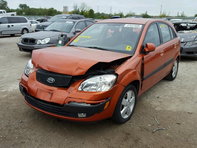 KNADE243296586632 - 2009 KIA RIO 5 SX ORANGE photo 2