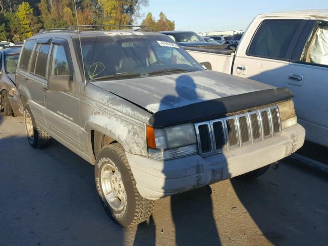 1J4GZ58Y4VC666497 - 1997 JEEP GRAND CHER GRAY photo 1