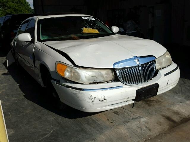 1LNHM81W9XY648680 - 1999 LINCOLN TOWN CAR WHITE photo 1