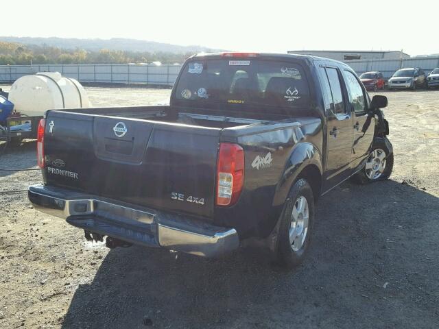 1N6AD07W06C469886 - 2006 NISSAN FRONTIER C BLACK photo 4