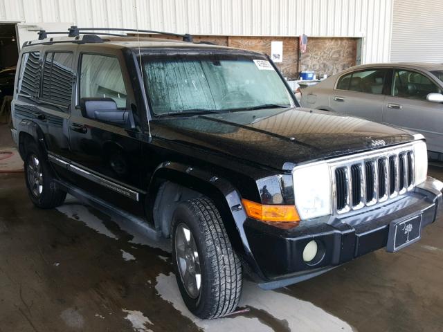 1J8HH58N76C144525 - 2006 JEEP COMMANDER BLACK photo 1