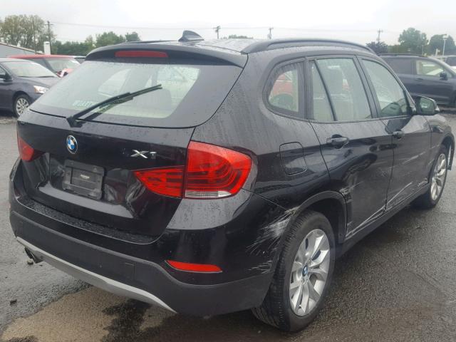 WBAVL1C59EVY20899 - 2014 BMW X1 XDRIVE2 BLACK photo 4