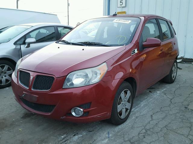 KL2TD66E09B648398 - 2009 PONTIAC G3 RED photo 2