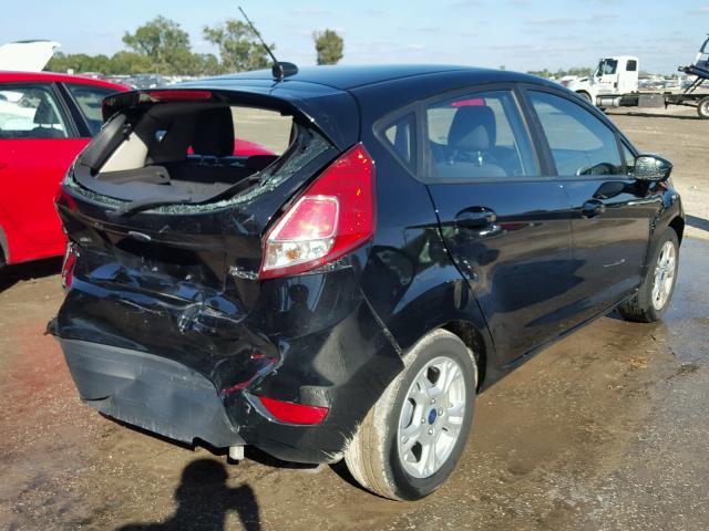 3FADP4EJ9GM112931 - 2016 FORD FIESTA SE BLACK photo 4