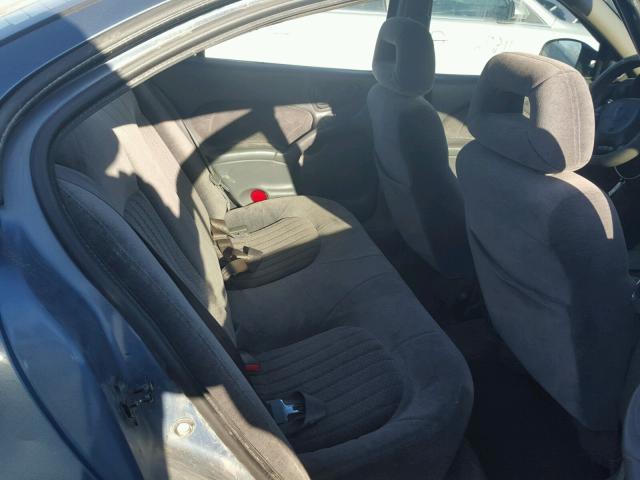 1G2NE52E4XM725444 - 1999 PONTIAC GRAND AM S BLUE photo 6