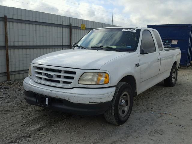 1FTZX1720YNC38509 - 2000 FORD F150 WHITE photo 2