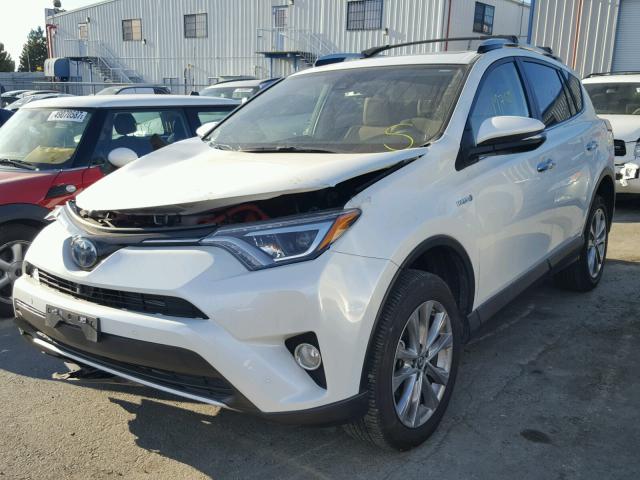 JTMDJREV9GD040376 - 2016 TOYOTA RAV4 HV LI WHITE photo 2