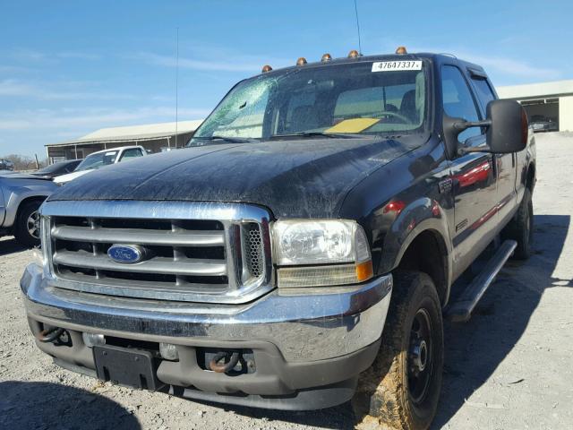 1FTSW31P04ED74590 - 2004 FORD F350 SRW S BLACK photo 2