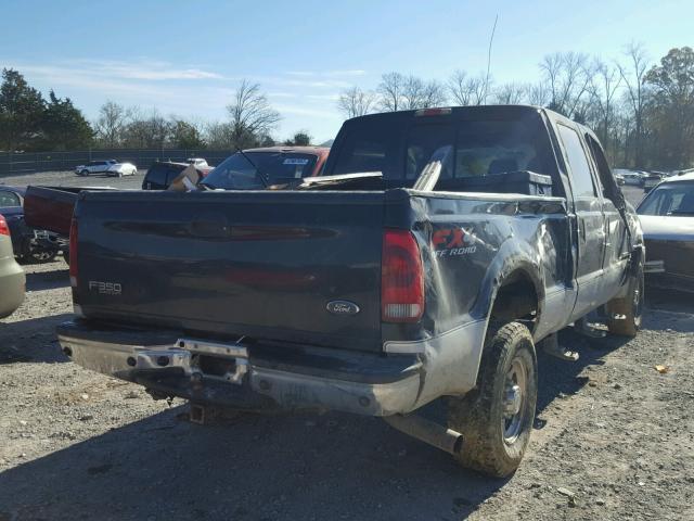 1FTSW31P04ED74590 - 2004 FORD F350 SRW S BLACK photo 4