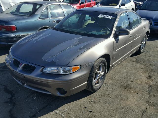 1G2WP52K4XF329989 - 1999 PONTIAC GRAND PRIX BROWN photo 2