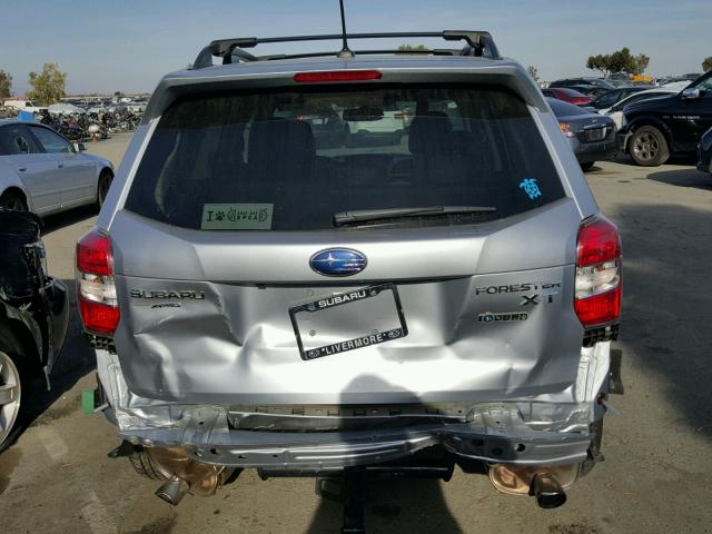 JF2SJGUC5FH525490 - 2015 SUBARU FORESTER 2 SILVER photo 9