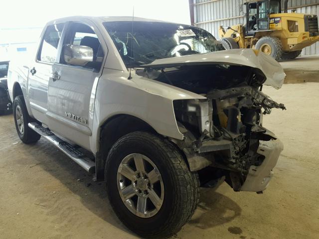 1N6BA0EDXCN324692 - 2012 NISSAN TITAN S SILVER photo 1