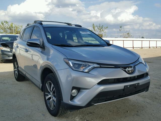 2T3WFREV0HW337308 - 2017 TOYOTA RAV4 XLE SILVER photo 1