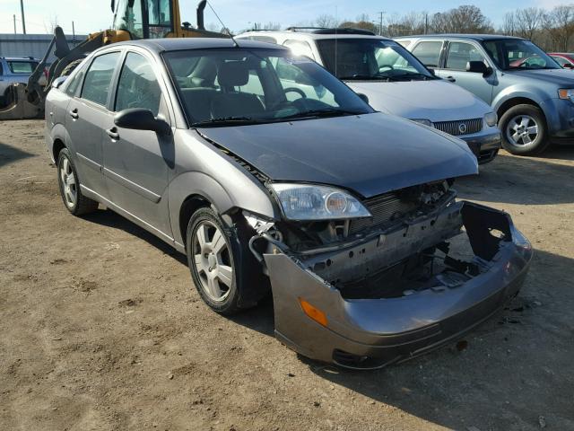 1FAHP34NX6W153874 - 2006 FORD FOCUS ZX4 GRAY photo 1