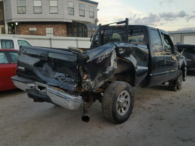 1FTWX31P06EA70807 - 2006 FORD F350 SRW S BLACK photo 4