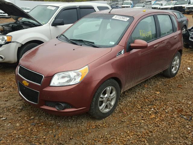 KL1TD6DE5BB251699 - 2011 CHEVROLET AVEO LS ORANGE photo 2