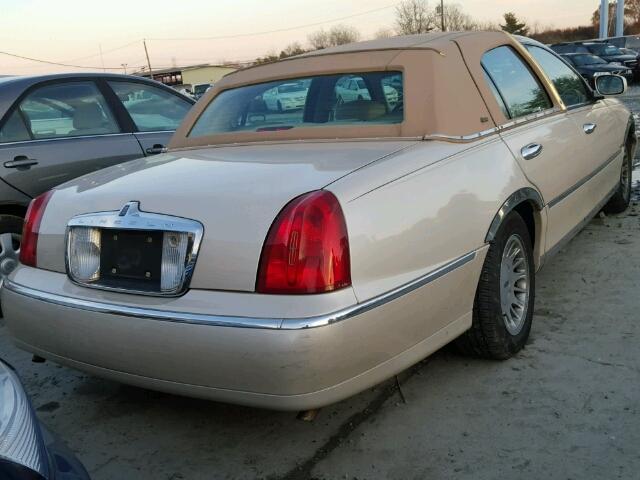 1LNHM83W7XY654474 - 1999 LINCOLN TOWN CAR C CREAM photo 4