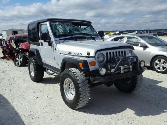 1J4FA69S64P743414 - 2004 JEEP WRANGLER / SILVER photo 1