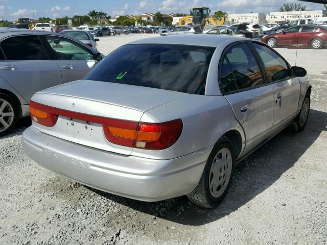 1G8ZK52792Z275724 - 2002 SATURN SL2 SILVER photo 4