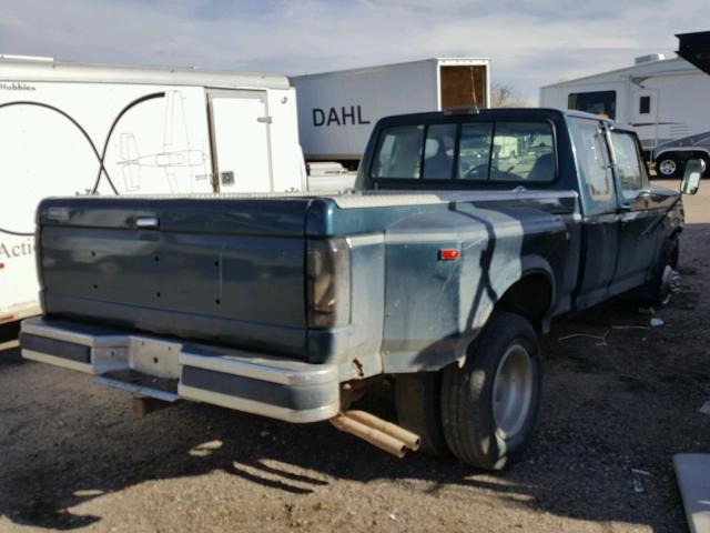 1FTJX35GXRKA89455 - 1994 FORD F350 BLUE photo 4