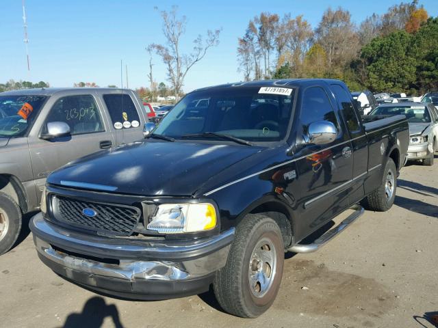 1FTDX1769VNA45168 - 1997 FORD F150 BLACK photo 2