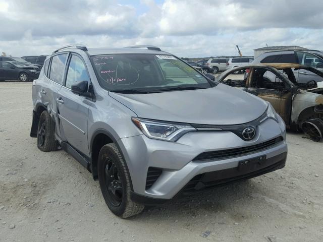 2T3ZFREV4HW395046 - 2017 TOYOTA RAV4 LE SILVER photo 1