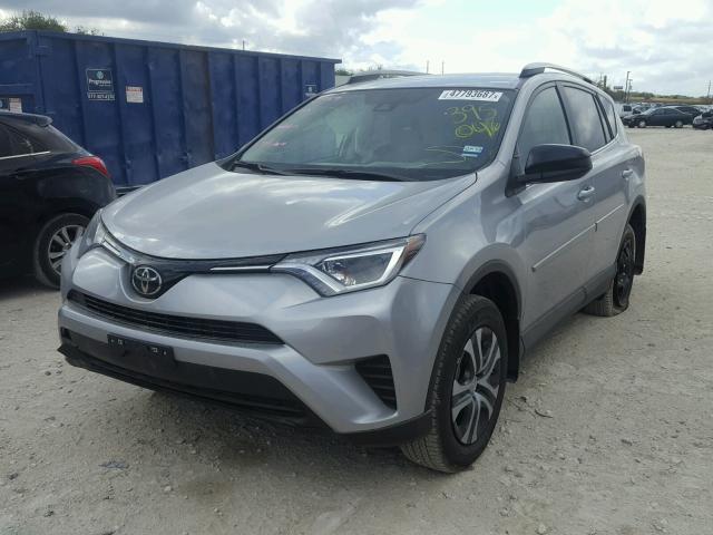 2T3ZFREV4HW395046 - 2017 TOYOTA RAV4 LE SILVER photo 2