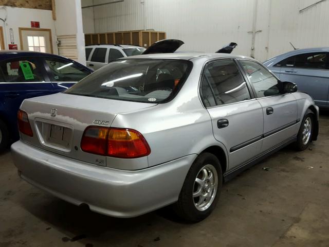 1HGEJ6679XL060539 - 1999 HONDA CIVIC LX SILVER photo 4