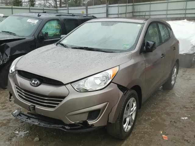 KM8JT3AB8BU192532 - 2011 HYUNDAI TUCSON GL TAN photo 2