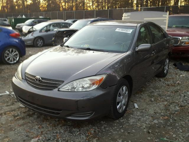 4T1BE32K64U872414 - 2004 TOYOTA CAMRY LE 金色 照片 2