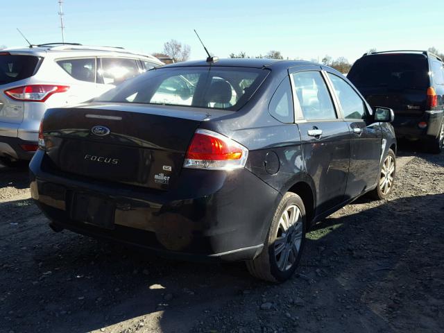 1FAHP35N68W144171 - 2008 FORD FOCUS SE BLACK photo 4