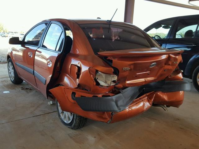 KNADE223496453986 - 2009 KIA RIO BASE ORANGE photo 3