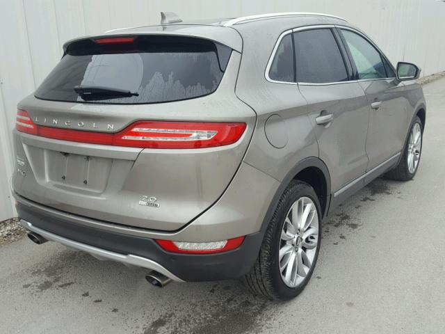 5LMCJ3C95GUJ21284 - 2016 LINCOLN MKC RESERV GRAY photo 4