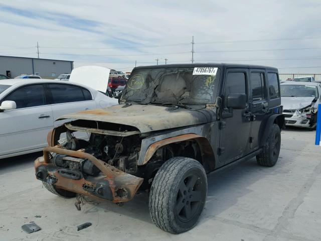 1J4BA6H11BL567447 - 2011 JEEP WRANGLER U BLACK photo 2