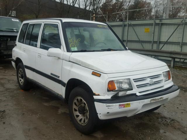 2S3TD03V5V6402086 - 1997 SUZUKI SIDEKICK J WHITE photo 1