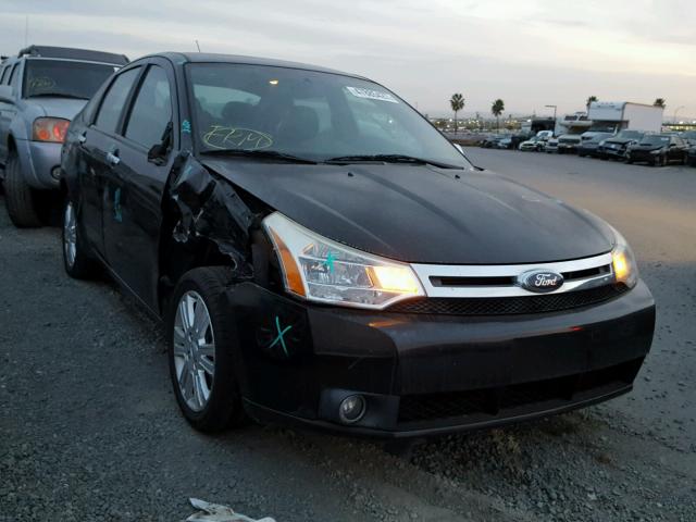 1FAHP3HN8AW211256 - 2010 FORD FOCUS SEL BLACK photo 1