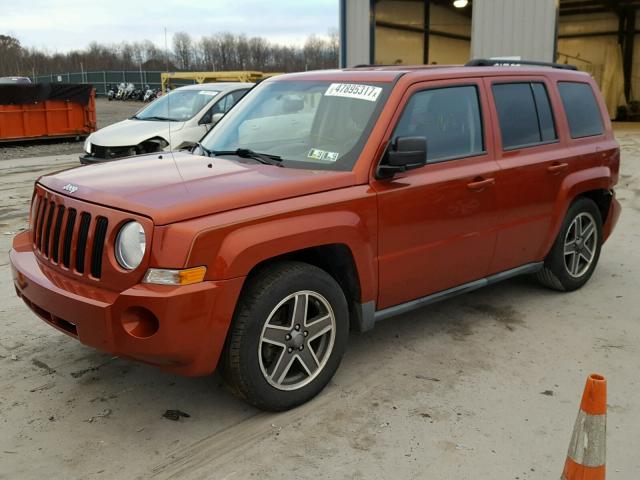 1J4NF2GB8AD536691 - 2010 JEEP PATRIOT SP ORANGE photo 2