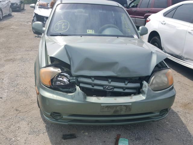 KMHCG45C74U557338 - 2004 HYUNDAI ACCENT GL GREEN photo 7