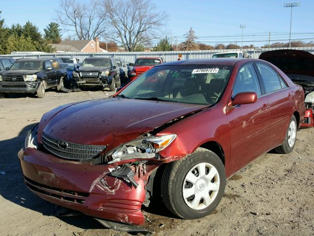 4T1BE32K12U002650 - 2002 TOYOTA CAMRY LE RED photo 2